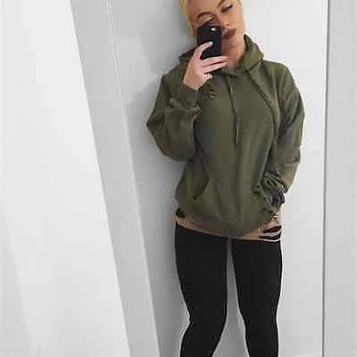 Ladies distressed cut pullover sweater