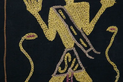 Rare old ceremonial hand spun hand woven black hemp textile loin cloth, Protective royal ancestor motif guarded by marine animals, Embroidery is hand twisted bark rope fiber twine. Melolo Village Sumba Indonesia (RE2) 35" x 13.5"