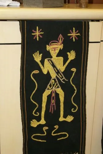 Rare old ceremonial hand spun hand woven black hemp textile loin cloth, Protective royal ancestor motif guarded by marine animals, Embroidery is hand twisted bark rope fiber twine. Melolo Village Sumba Indonesia (RE2) 35" x 13.5"