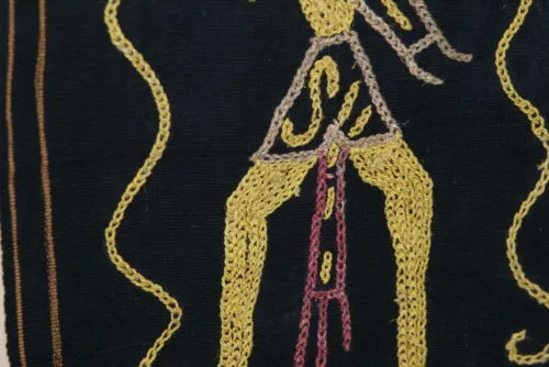 Rare old ceremonial hand spun hand woven black hemp textile loin cloth, Protective royal ancestor motif guarded by marine animals, Embroidery is hand twisted bark rope fiber twine. Melolo Village Sumba Indonesia (RE2) 35" x 13.5"