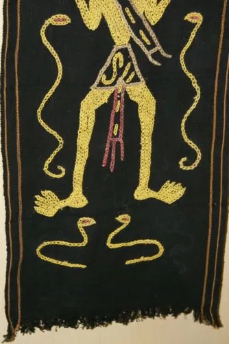 Rare old ceremonial hand spun hand woven black hemp textile loin cloth, Protective royal ancestor motif guarded by marine animals, Embroidery is hand twisted bark rope fiber twine. Melolo Village Sumba Indonesia (RE2) 35" x 13.5"